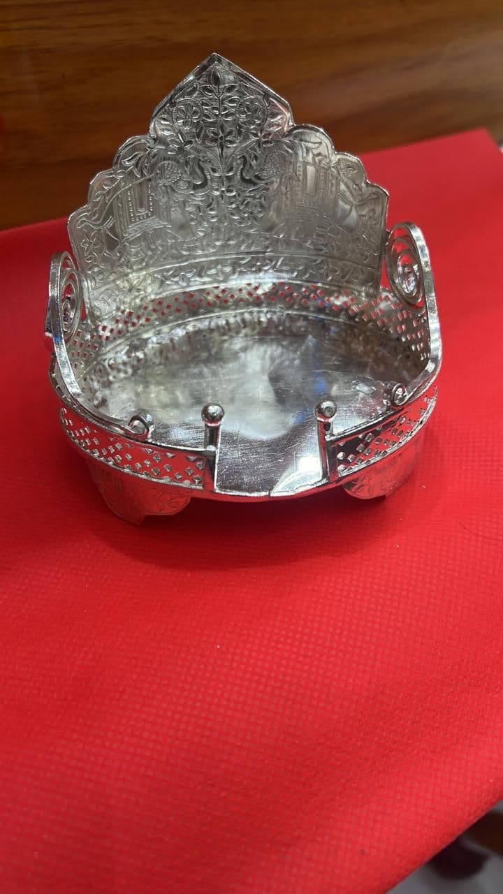 Engraved silver singhasan